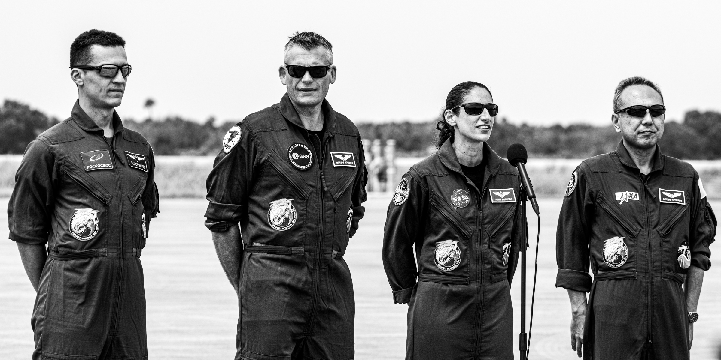 The four member of Crew-7 stand at KSC's Launch & Landing Facility.