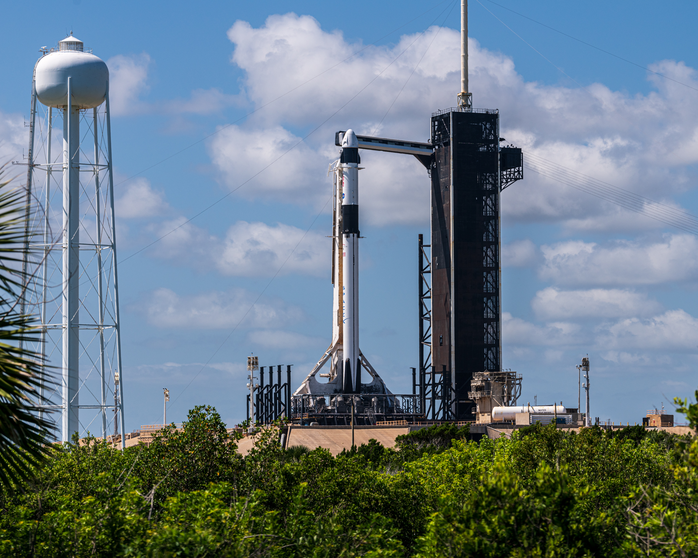 LC-39A with Falcon 9 an Dragon Endurance. As seen over some mangroves along Cape Rd.