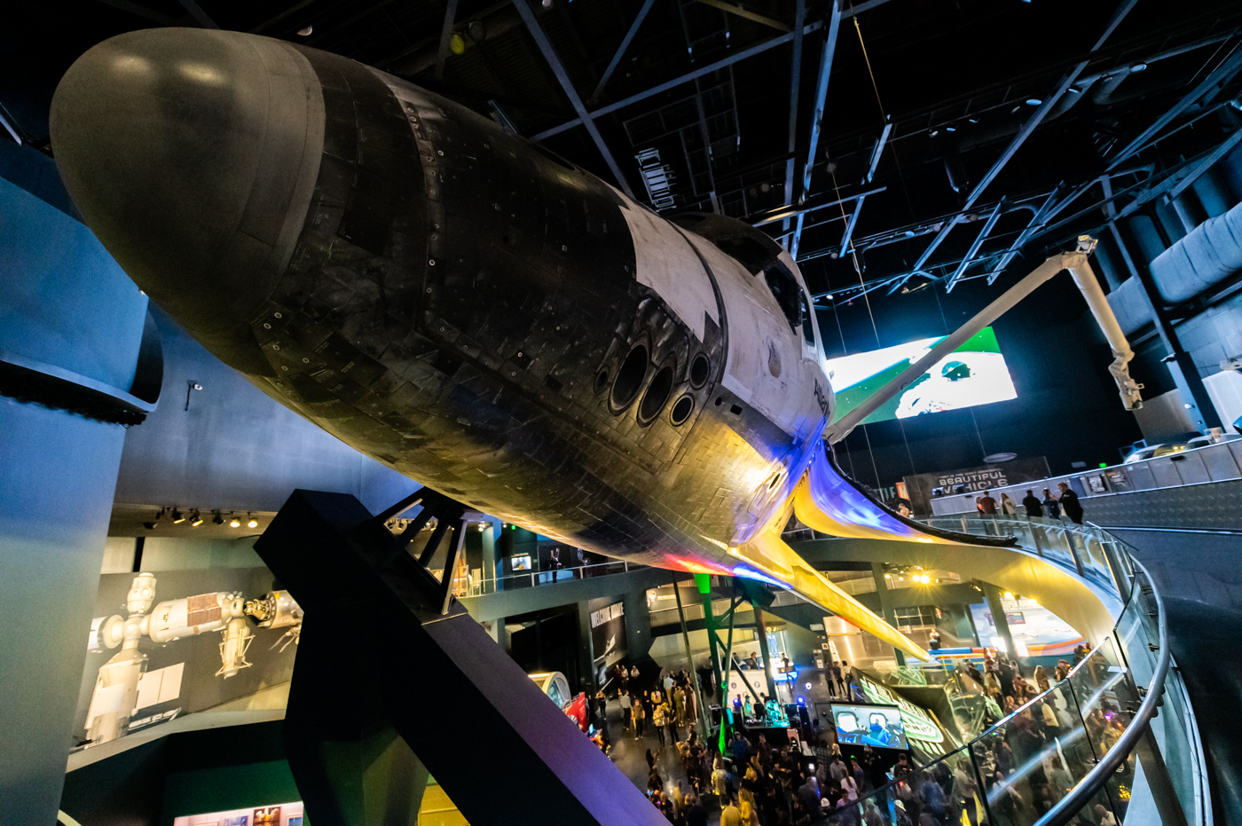 Dancing party underneath Space Shuttle Atlantis
